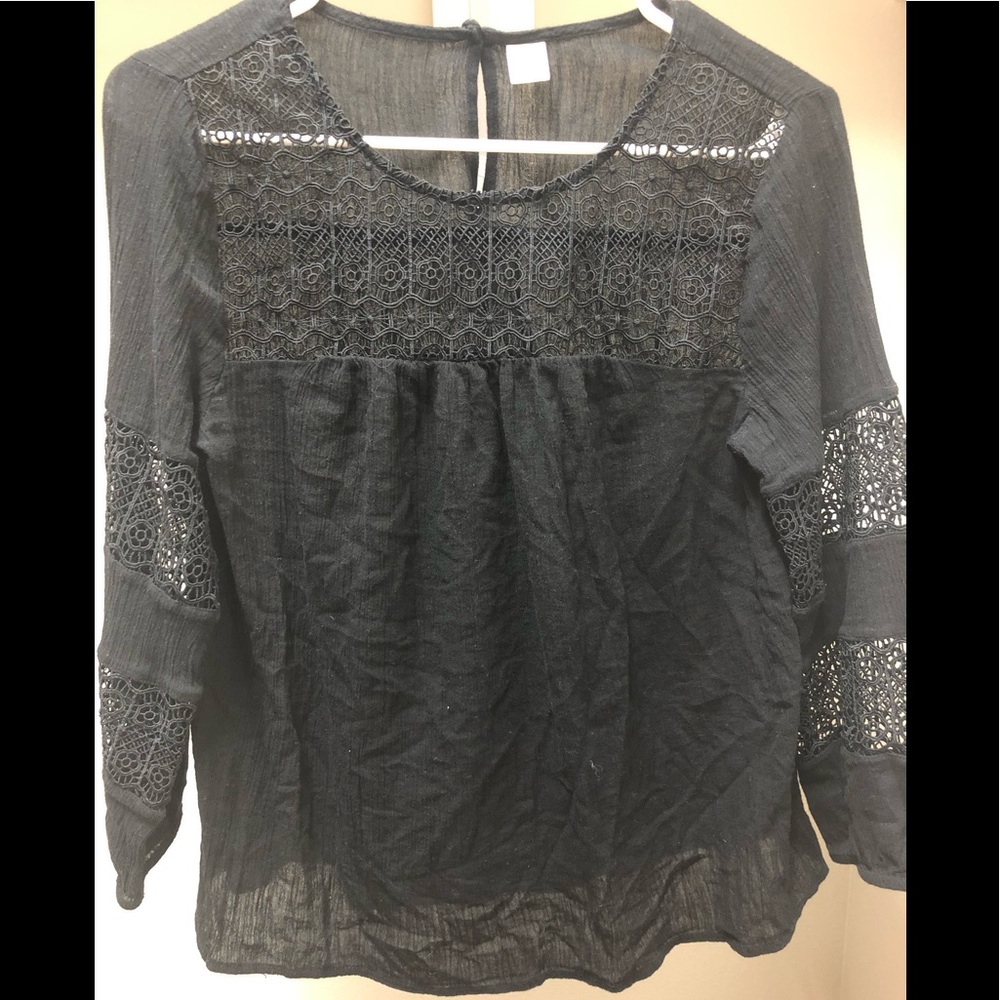 Black top with detailed sleeves